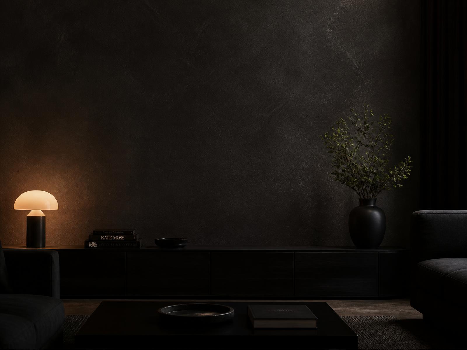 Glance mounted above a sideboard on a charcoal wall in a calm, dark living room